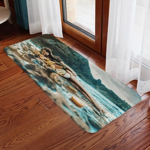 Detail of a tropical fruit printed flannel floor mat on dark wood floor by a window