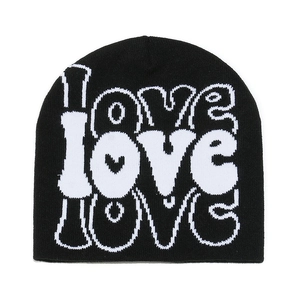 Winter knitted beanie in black with white LOVE jacquard pattern and street style