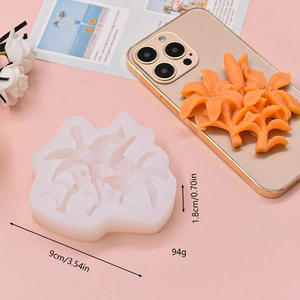 Macro view of a 3D lily flower silicone mold with orange resin craft for DIY