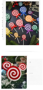Close-up of colorful Christmas candy lollipop ornaments with ribbon bows and swirls