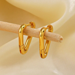 Minimalist 18K gold plated stainless steel triangle hoop earrings for women on a wooden stand