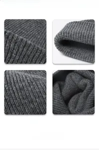 Macro view of gray merino wool knit showing premium rib-knit texture and soft stitching