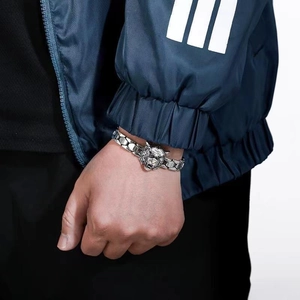Men's silver tiger head watch band bracelet with vintage geometric chain on wrist