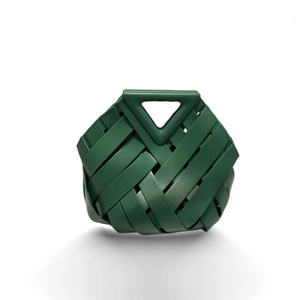 Green woven leather tote bag with unique triangular handle and magnetic buckle design