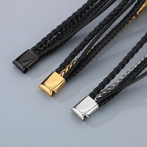 Detail of multi-layer braided leather bracelets featuring magnetic clasps in various colors