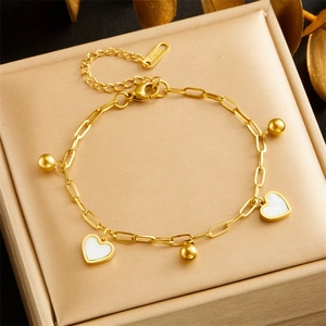 Gold-plated stainless steel chain bracelet with white heart pendants and gold beads