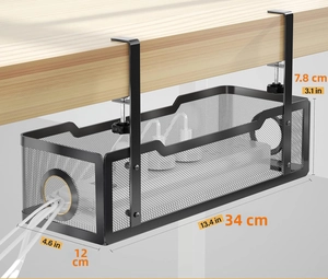 Macro view of a black metal mesh cable management tray with adjustable G-clamps for desks