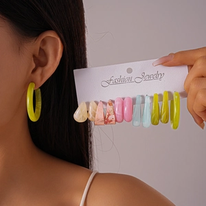 12-piece set of colorful geometric resin hoop earrings and studs in multiple vibrant shades