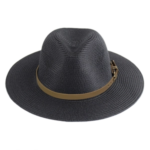 Vintage dark grey straw panama hat with a brown leather belt buckle for sun protection
