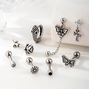 8pcs silver butterfly snake and cross surgical steel stud earrings set on white display