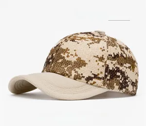 Detailed view of camouflage yellow straw woven baseball cap with textured pixel pattern