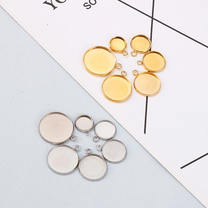 Golden and silver stainless steel round bezel tray pendants in multiple sizes for jewelry