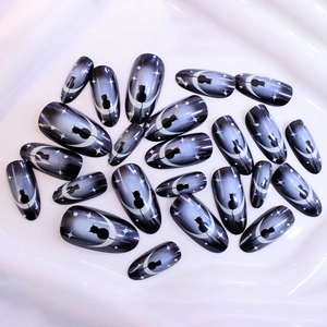 Long almond press-on nails with dark purple gradient and black cat on moon design