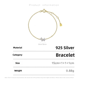 Detail view of S925 silver puppy charm bracelet with 18K gold plating and sizing specifications