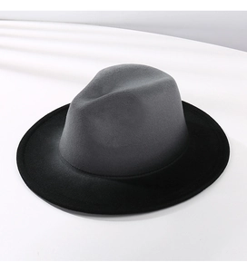 Detailed side view of two-tone wool felt jazz fedora hat in dark grey and black