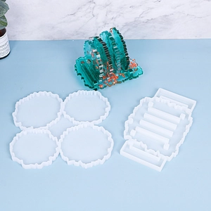 Detailed view of silicone resin molds for coasters and a matching storage holder set
