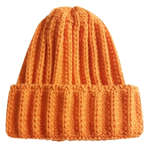 Classic orange ribbed knit beanie hat for men and women on a clean white background