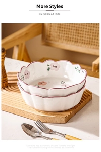 Close-up of wavy petal-edge ceramic bowls with elegant pink floral pastoral patterns