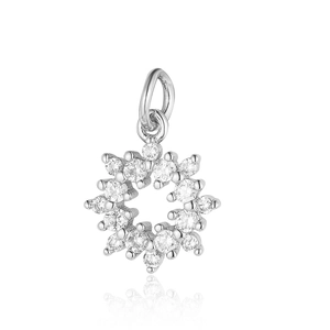 Close-up of snowflake pendant with sparkling silver zircon stones and hanging loop