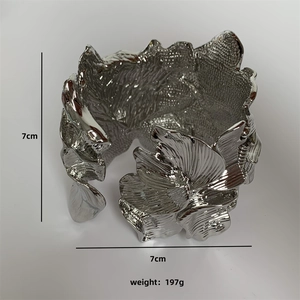 Silver oversized metal flower petal cuff bracelet with exaggerated wide open design