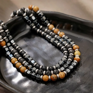 Mens multi-layer beaded bracelet featuring volcanic lava rock, agate and metal hematite