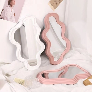 Irregular cloud-shaped vanity mirror for desktop and wall decor in white and pink matte colors