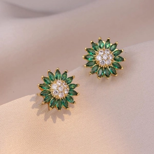 Fashionable green sunflower stud earrings with white zircons on champagne silk surface