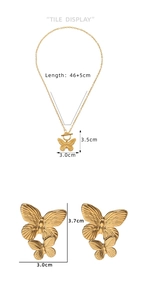 Detail of gold butterfly necklace and earrings set with OT toggle clasp and measurements