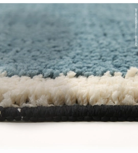 Macro shot showing the thick absorbent microfiber texture of the plush bathroom rug