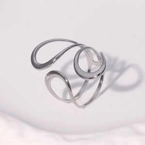 Detailed view of silver abstract cutout ring featuring a sleek minimalist hollow line design