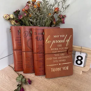 Vintage A6 brown leather journals with embossed inspirational quotes and elastic bands