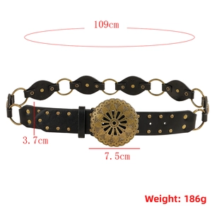 Détail de ceinture vintage avec boucle fleur de soleil en bronze et des rivets