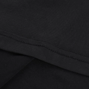 Detail of the high-quality black mesh fabric and precise stitching on the evening dress