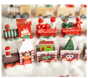 Detailed view of wooden Christmas train with gingerbread man and festive snowflake patterns