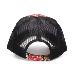 Detail of black mesh trucker hat featuring breathable material and red floral pattern