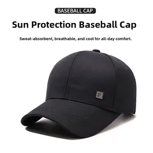 Detail of black cotton baseball cap with a square metal F logo plate on the side