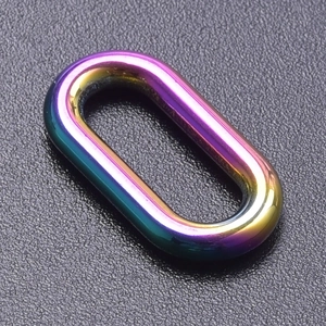 Macro shot of a rainbow-plated oval stainless steel ring for DIY jewelry making