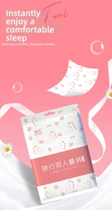 Close-up of thickened disposable bedding set for travel in pink double-person packaging