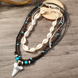 Multi-layer beach necklace set with natural shells, wood beads and shark tooth pendant