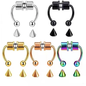 Detailed view of magnetic septum rings in five colors with interchangeable spike heads