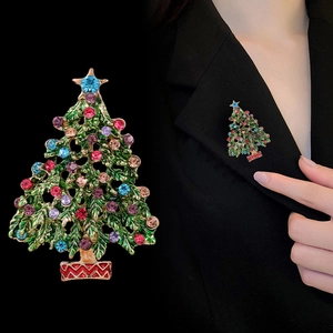 Christmas tree brooch with colorful rhinestones on green enamel for festive holiday styling