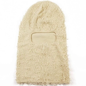 Beige knitted balaclava mask for winter made of textured plush faux fur material