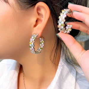 Colorful S925 sterling silver hoop earrings with square zircon stones on model