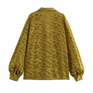 Mustard yellow textured V-neck blouse for women featuring stylish puff sleeves and back view