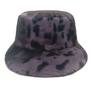 Purple leopard print faux fur bucket hat with soft plush texture for winter warmth