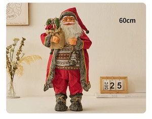 Detail of 60cm Santa Claus figurine in red robe with lantern and festive decor