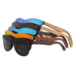 Bamboo wood arm rimless polarized sunglasses in multiple lens colors with metal rivets