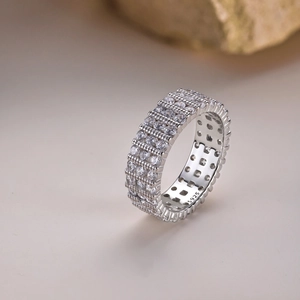 Detailed view of S925 sterling silver ring featuring triple-row pave-set cubic zirconia
