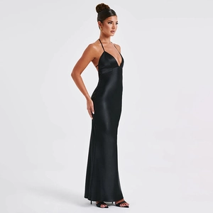 Side view of elegant black satin floor-length dress with a sexy backless V-neck design