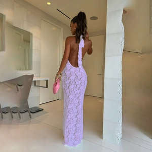 Detailed back view of a light purple lace halter maxi dress with criss-cross straps